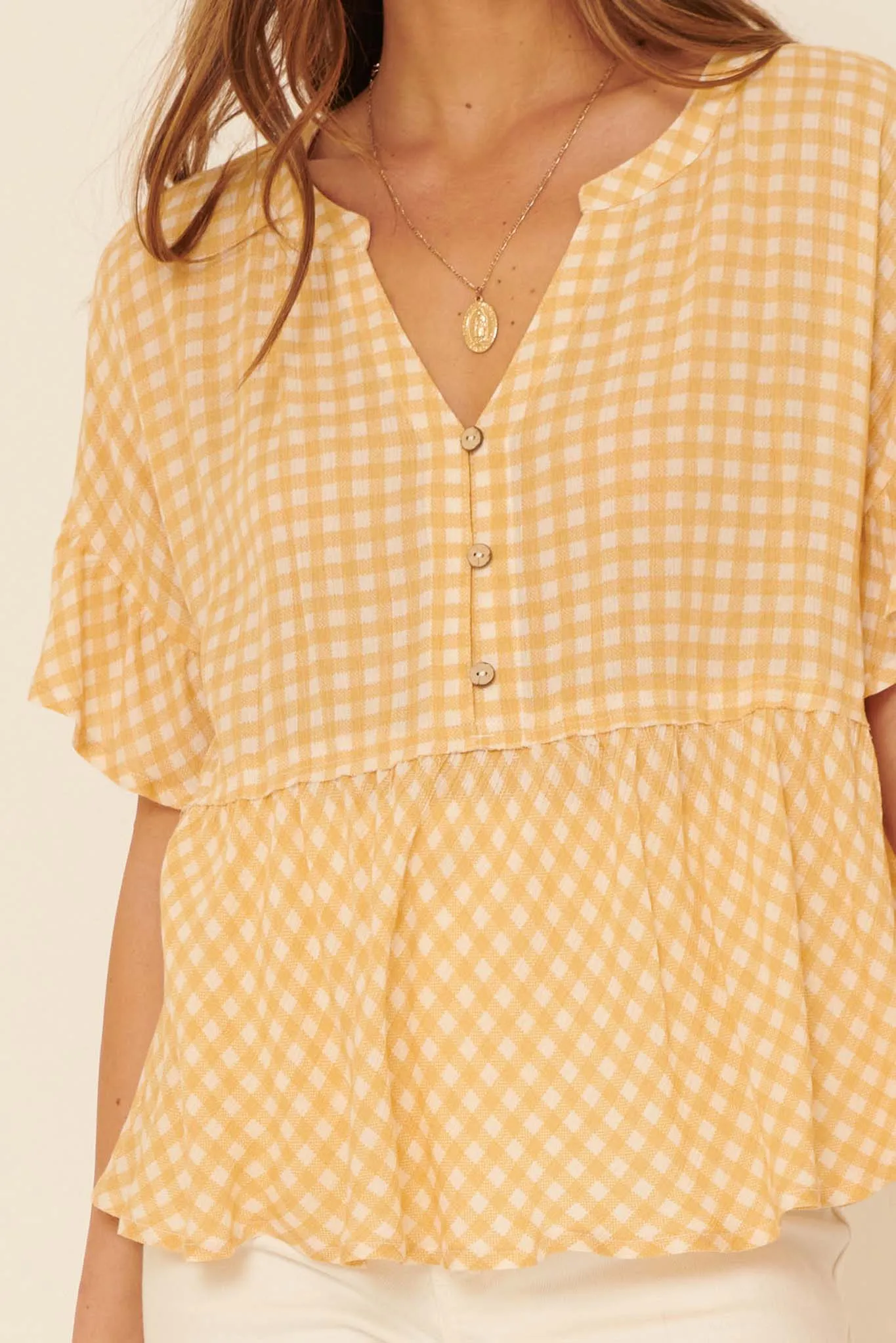 Weekender Ruffled Plaid Henley Babydoll Top