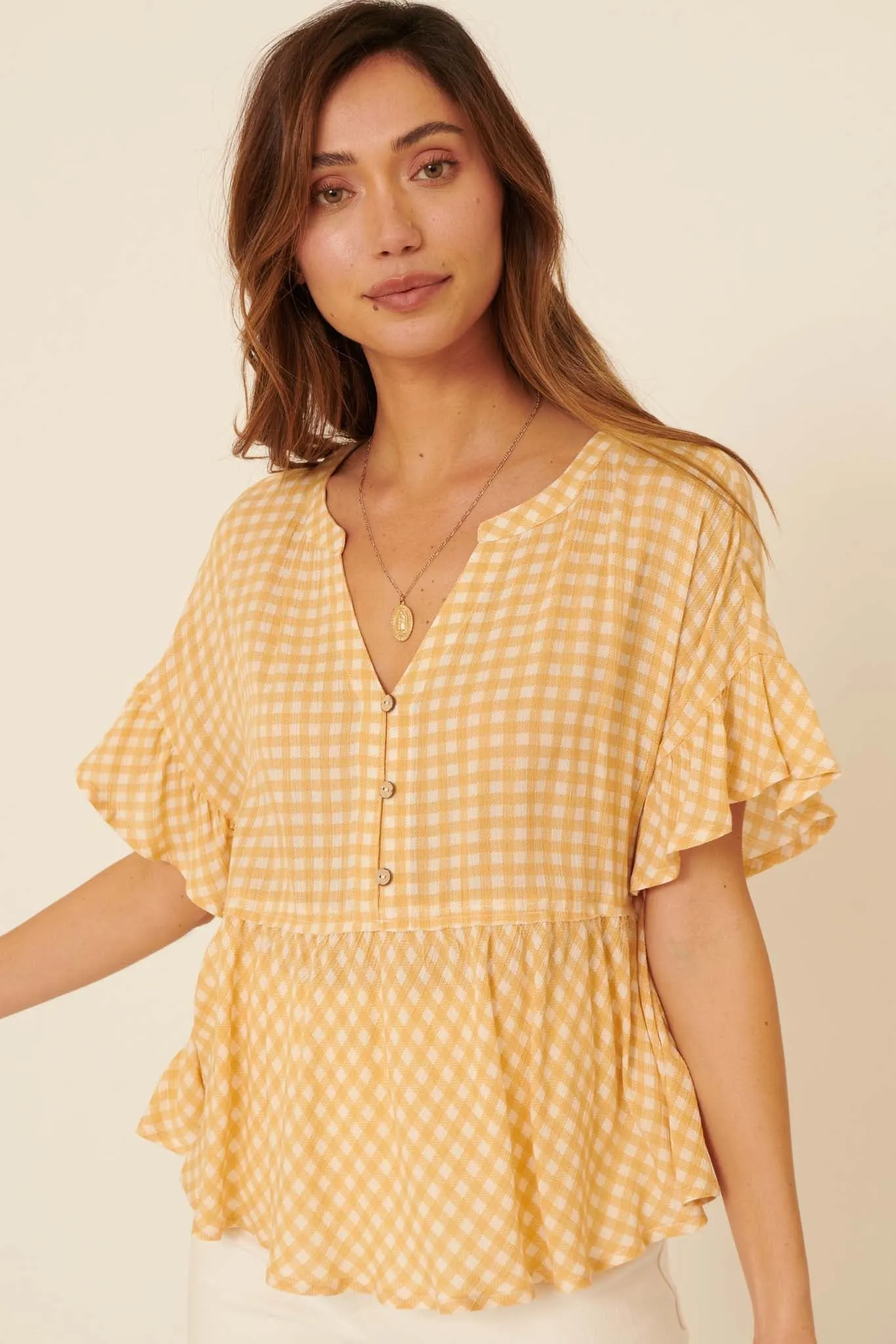 Weekender Ruffled Plaid Henley Babydoll Top