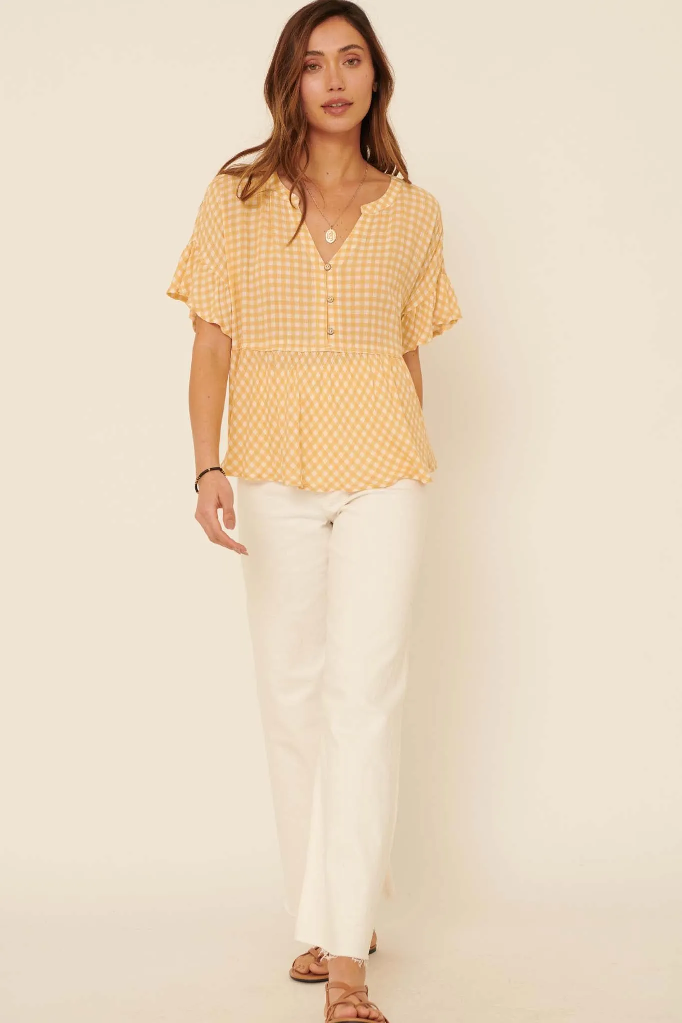 Weekender Ruffled Plaid Henley Babydoll Top